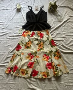 Chic Black Peplum Top &amp; Floral Skirt Set