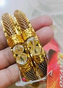 Brand new Elegant Gold Bangles with Red Stones