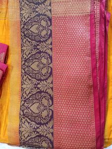Vibrant Yellow Saree with Brocade Blouse