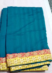 Teal Blue Saree with Floral Border