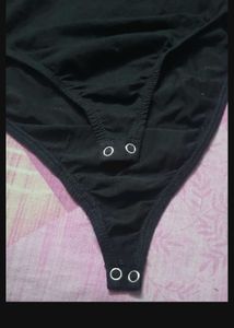 Lace Trimmed Black Bodysuit