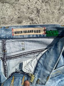 Distressed Light Wash Flare Jeans