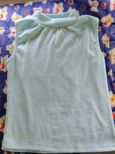Pale Blue Sleeveless Mock Neck Top