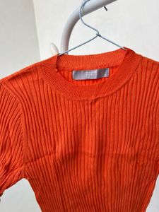 Orange Ribbed Knit Top