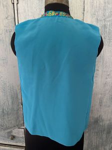 Turquoise top with Embroidered Neckline