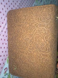 Elegant Embossed Clutch and sling bag