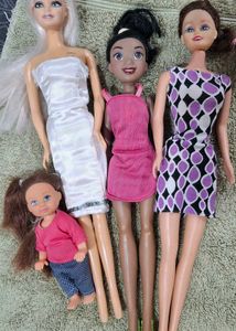 Lot of 4 Fashion Dolls