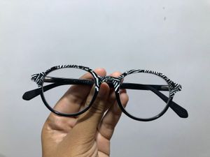 Vicent Chase Blue lens zebra print frame.