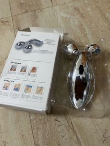 brand new Silver Facial Roller Massager