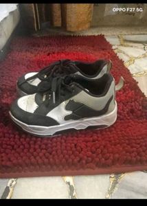 7. BOYs Black and White Sneakers