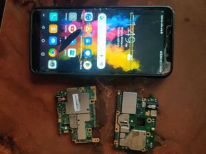 2 Motherboards+ 1 phone