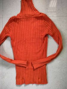 Orange Ribbed Turtleneck Sweater