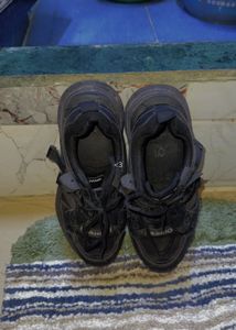 trending black sneakers