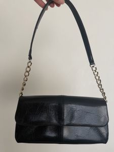 Chic Black Shoulder Bag with Chain Detail