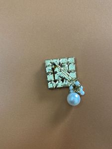 Elegant Diamond and Pearl Brooch