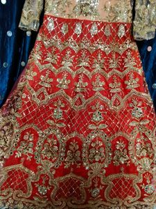 bridal gown peach and red colour