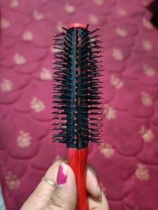 Brand New Rolling Hair Brush.