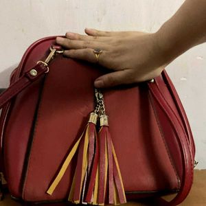 Red Handbag with Tassel Detail