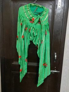 get free green paranda Orange Salwar Kameez