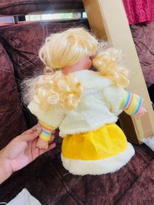 Cute Doll with Blonde Pigtails