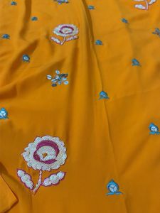Vibrant orange unstitched suit  Embroidered Saree