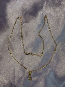 Elegant Gold Necklace with Crystal Pendant