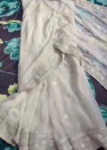 Elegant White Saree with Silver Embellishments