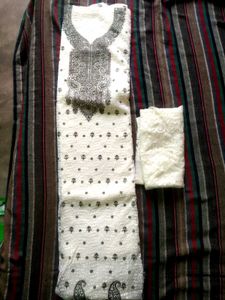 Elegant White Kurta Set with Intricate Embroidery