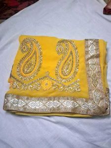 embroidery and stone work yellow color saree