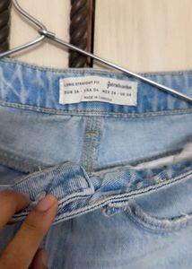 Ripped Light Wash Denim Jeans