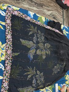 Elegant Black Saree with Floral Blouse