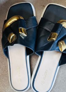 Stylish Black Slides with Gold Accent