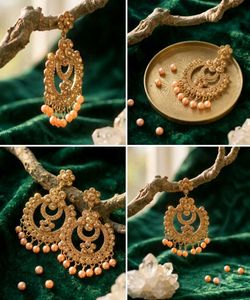 Exquisite Gold Jhumka Earrings with Pearls