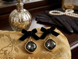 Elegant Black Bow Gemstone Earrings
