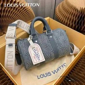 *Louis Vuitton Monogram  washed Denim Keepall Band