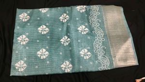 Beautiful Teal Saree with White Motifs
