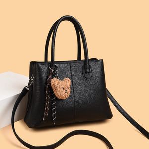 Chic Black Tote Bag with Bear Charm