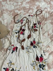 off white jumpsuit with floral touch