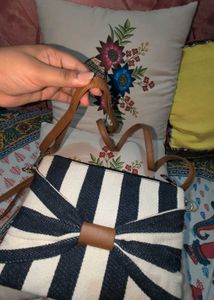 Striped Clutch with Bow Detail
