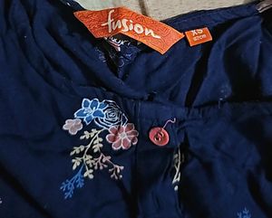Its Navy Blue Top With Some Multi Colour Flowers
