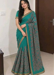 Elegant Teal Saree with Intricate Print