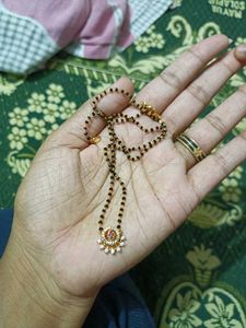 balck beads with Diamond and Ruby Pendant
