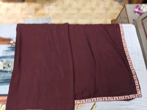 Maroon saree with Embroidered Border