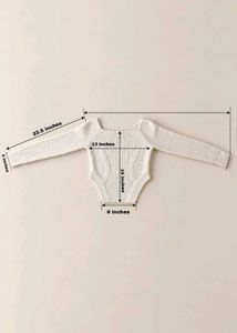 IVORY RIBBED KNIT LONG-SLEEVE BODYSUIT
