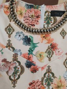 Floral Print Embellished peplum top