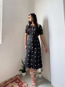imported Chic Black Floral Midi Dress