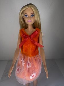 Reserved Barbie Doll in Orange Dress