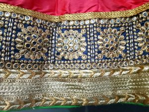 Red lehanga with stunning golden border
