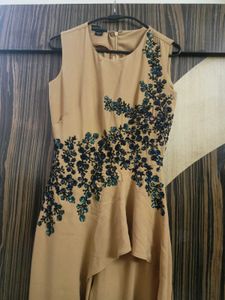 Elegant Beige Jumpsuit with Embellishments