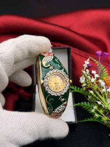 Elegant Peacock Bangle Watch
